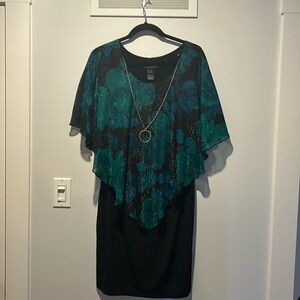 Ladies short dress with green sparkly overlay